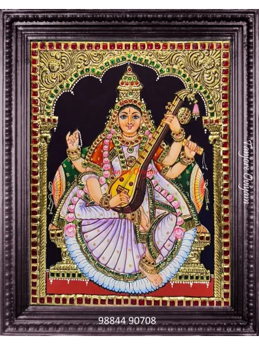 Saraswathi Tanjore painting for home with veena, gold foil work and traditional arch design